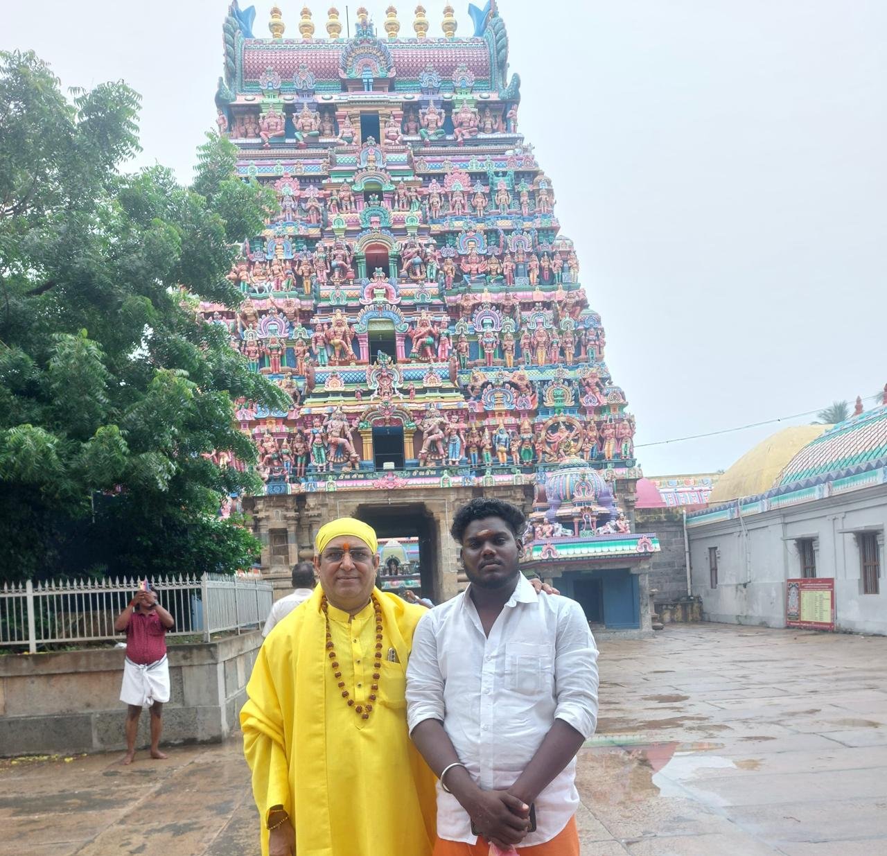 Guruji at the temple gopuram with a visiting guest