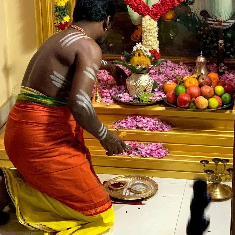 A traditional offering of fruits and flowers at the shrine