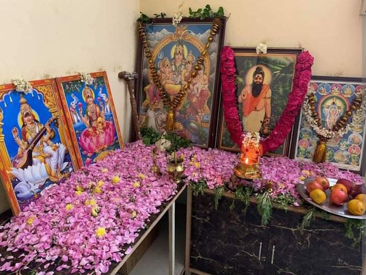 A decorated temple altar with deities